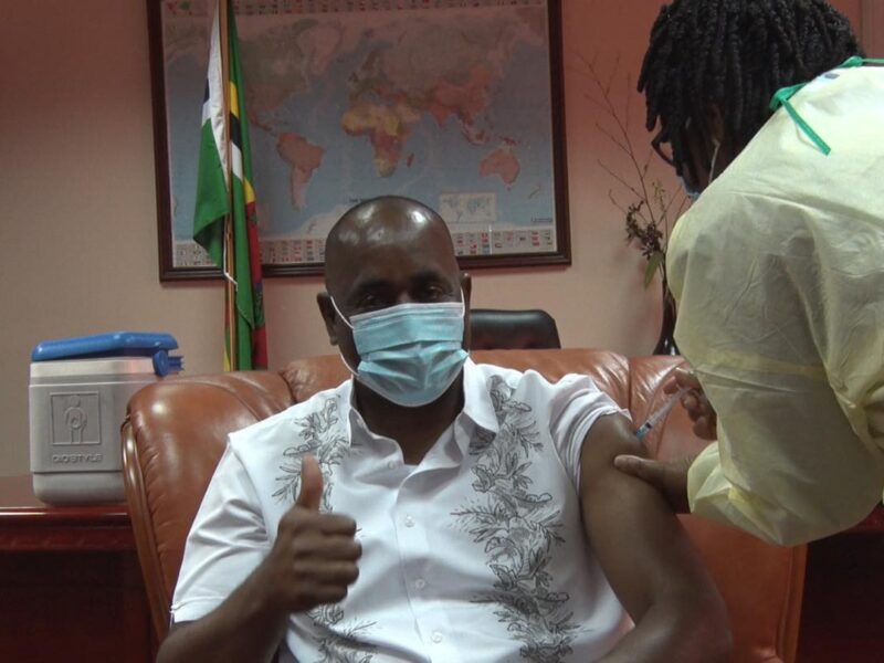 Prime Minister Roosevelt Skerrit takes the Oxford AstraZeneca Vaccine on television in February 2021.