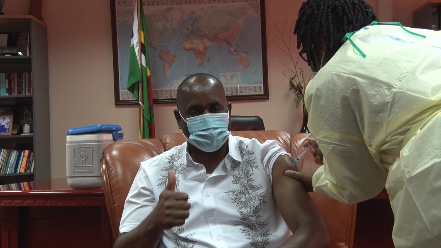 Prime Minister Roosevelt Skerrit takes the Oxford AstraZeneca Vaccine on television in February 2021.