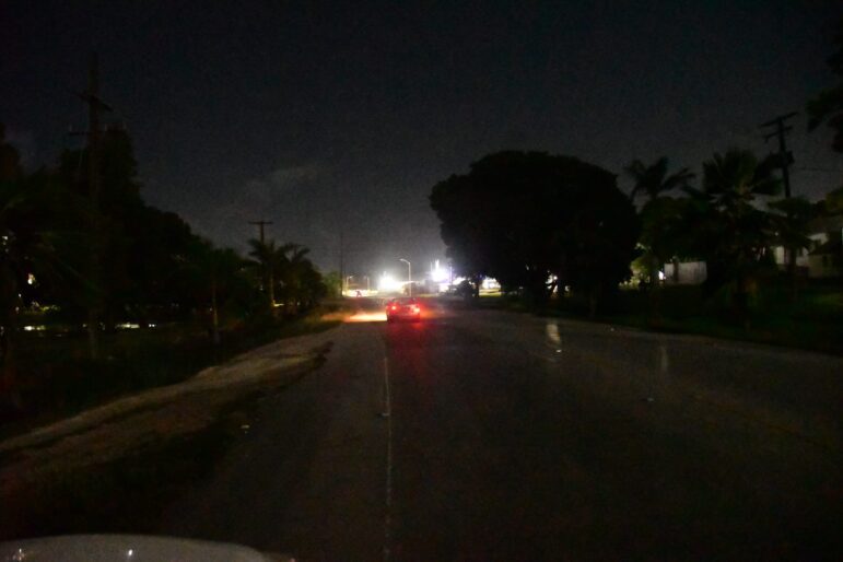 Headlights illuminates parts of the Mighty Grynner Highway. 